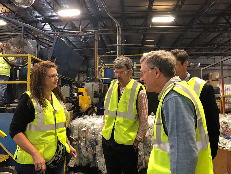 The MSS team takes legislators on a tour of a Tomra NorthAmerica facility