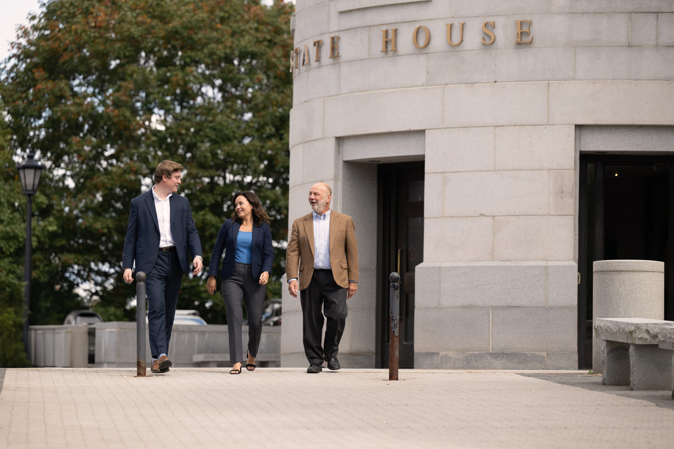 Sam Hamilton, Clara McConnell, and Mike Saxl at the Maine State House